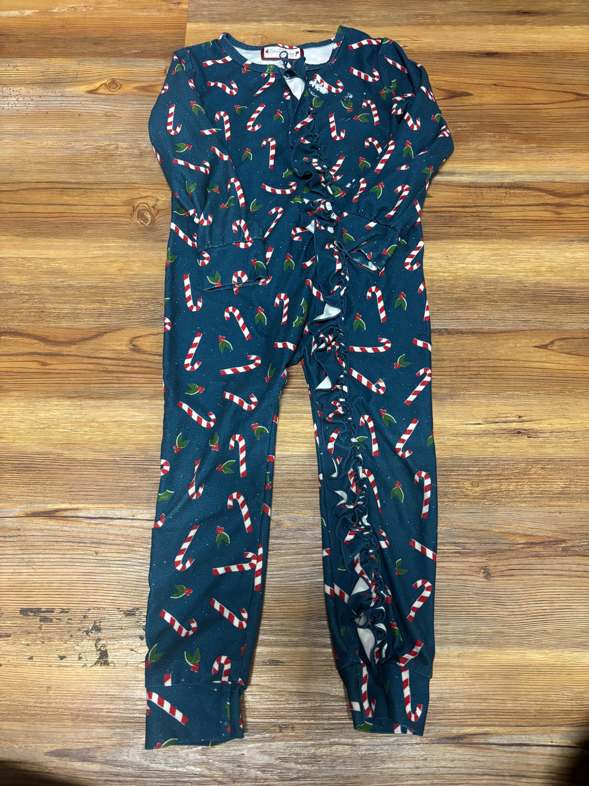 Navy Candy Cane Ruffle Romper (spots)