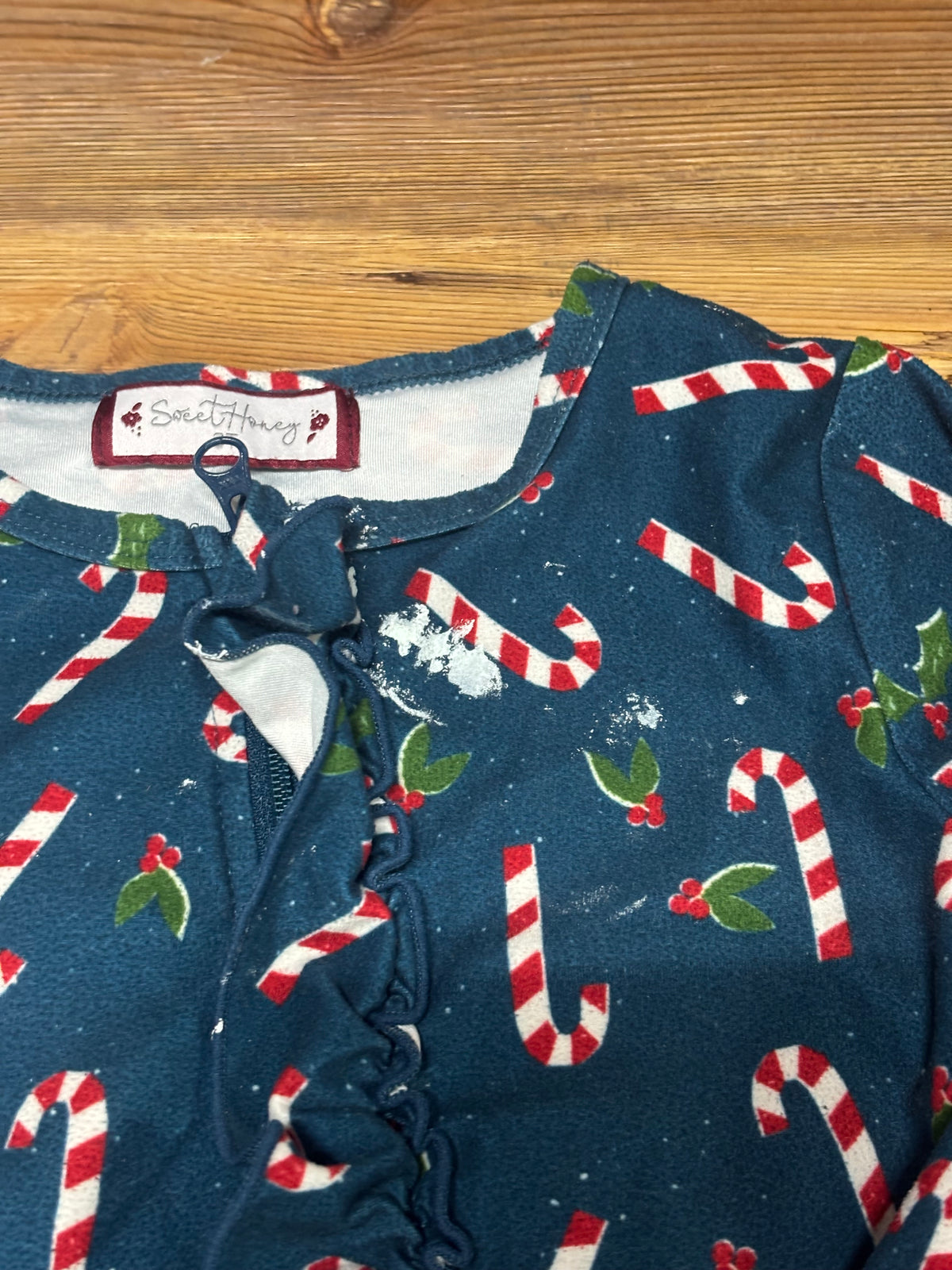Navy Candy Cane Ruffle Romper (spots)
